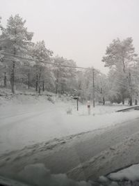 Scenic view of frozen landscape against clear sky