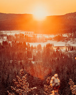 Scenic view of landscape against sky during sunset