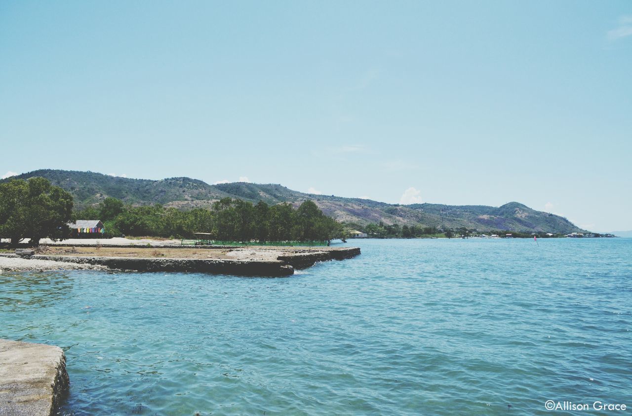 SCENIC VIEW OF SWIMMING POOL AGAINST CLEAR SKY