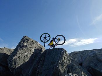 Bike flips on the cliff 