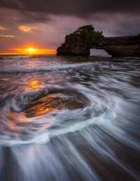 Scenic view of sea against sky during sunset