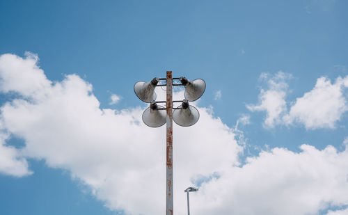 Low angle view of street light against sky