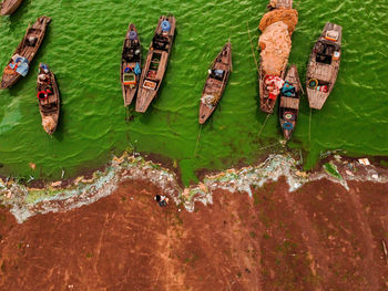 High angle view of leaves floating on lake