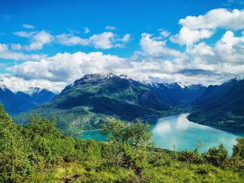 View of mountain range against cloudy sky