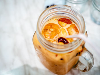 High angle view of juice in mason jar on table