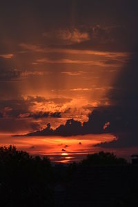 Scenic view of dramatic sky during sunset