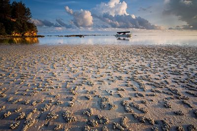 Scenic view of calm sea against sky