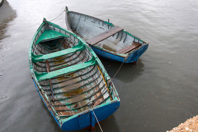 High angle view of fishing boat moored in lake