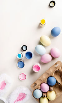 High angle view of pills on white background