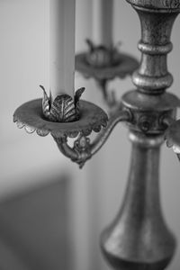 Close-up of animal representation on table at home