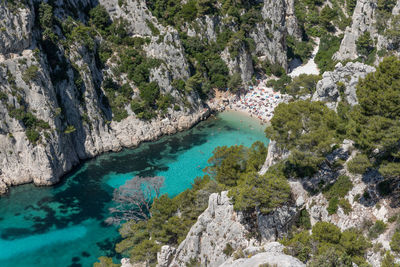 High angle view of rocks by sea