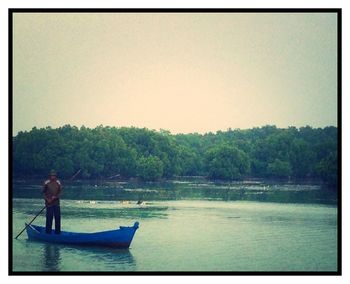 People relaxing in lake