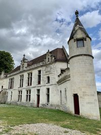 Low angle view of old building against sky