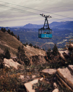 Overhead cable car over mountains