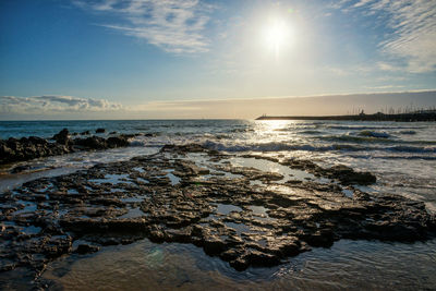 Scenic view of sea against sky during sunset