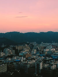 High angle view of buildings against sky during sunset