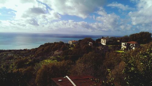 Scenic view of sea against cloudy sky