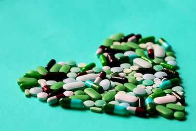 Close-up of multi colored candies on table