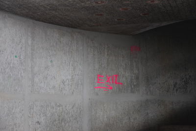 Close-up of text on wall