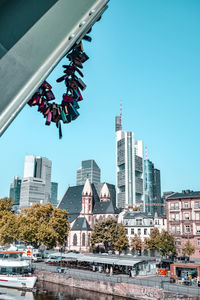 Low angle view of buildings against clear blue sky