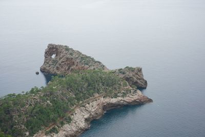 High angle view of rock formation in sea