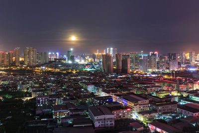 Illuminated cityscape at night