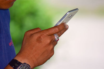 Close-up of person holding hands