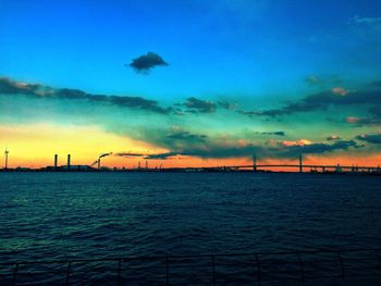 Scenic view of sea against sky at dusk