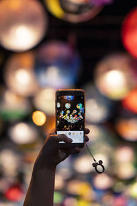 Close-up of hand holding smart phone