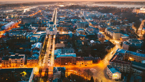 Aerial view of illuminated cityscape at night