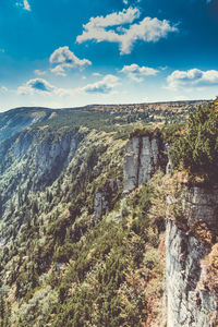 Scenic view of rocky mountains against sky