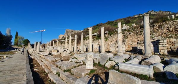 Panoramic view of historical building against blue sky