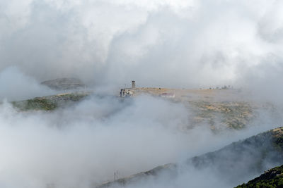 View of mountain amidst cloud 