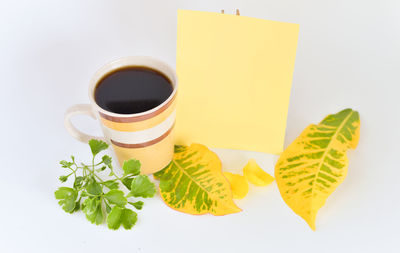 High angle view of coffee cup on table