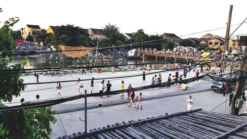 High angle view of people in park against clear sky