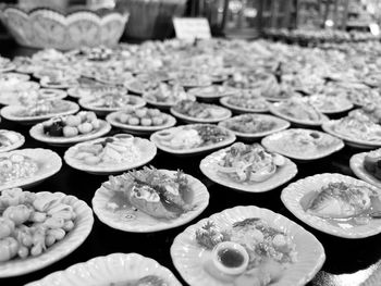 High angle view of seafood served in plates on table