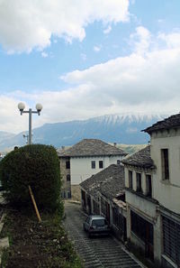 Houses against cloudy sky at gjirokaster