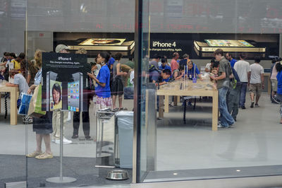 Group of people waiting for sale at bus station