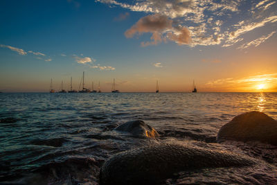 Scenic view of sea against sky during sunset