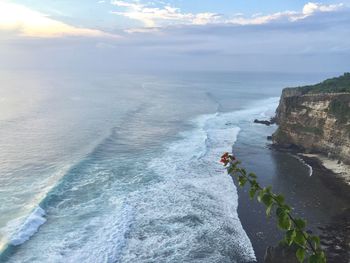 High angle view of man in sea against sky