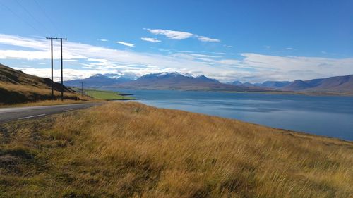 View of lake against cloudy sky