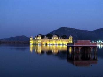 Scenic view of lake at night