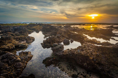 Scenic view of sea against sky during sunset