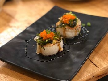 High angle view of sushi in plate on table