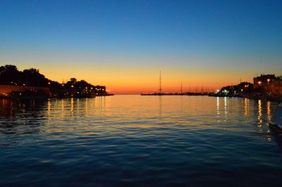 Scenic view of sea at dusk