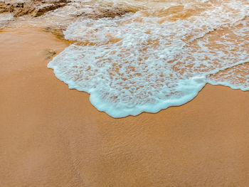 High angle view of sand on beach