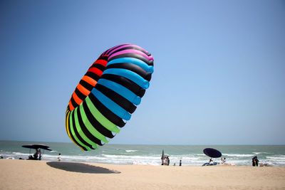 Scenic view of beach against clear sky