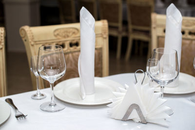 Drinking glasses on table in restaurant