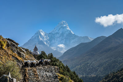 Panoramic view of mountains against sky