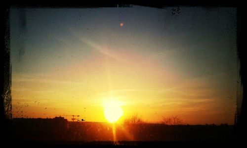 Sun shining through clouds